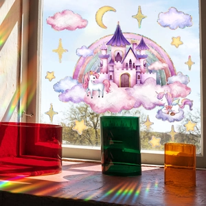 Rainbow prism window film with unicorn castle design casting colorful light on windowsill