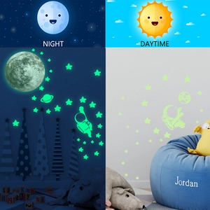 Luminous astronaut and moon wall stickers set shown in day and night glowing mode