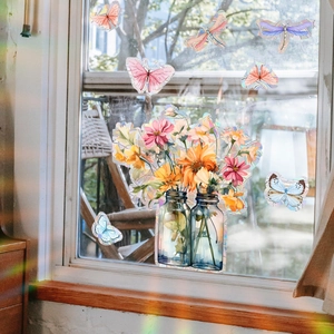 Rainbow holographic floral window cling with butterflies and sunflowers under sunlight