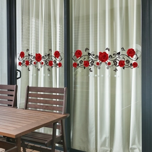 Double-sided rose and butterfly glass stickers on a sliding door in a cozy home setting