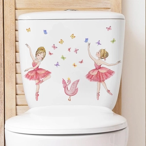 Detail of ballet girls and pink swan decals applied on a white ceramic toilet tank surface