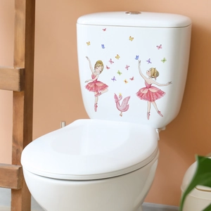 Detail of cute pink ballet girls and swan stickers on a white toilet tank decoration