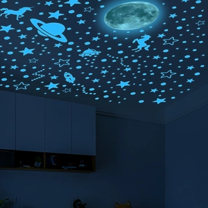 Glow in the dark unicorn and moon wall stickers set with glowing blue stars and planets