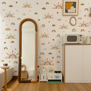 Stickers muraux arc-en-ciel bohème aux tons chauds pour une chambre d'enfant douillette