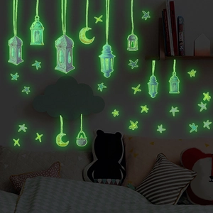 Luminous wall sticker set with glowing moon and stars for kids bedroom wall decor