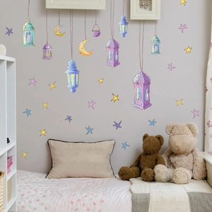 Close-up of luminous star and moon wall stickers on a warm bedroom interior wall decor