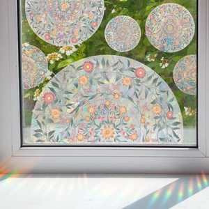 Rainbow prism window film with floral mandala designs creating colorful light reflections