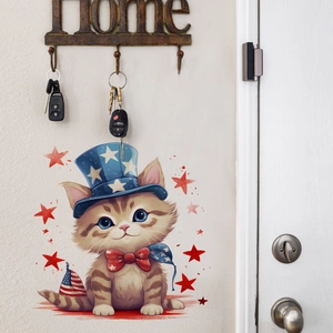 Detail showing a cute cat wall decal with stars on a home entrance wall