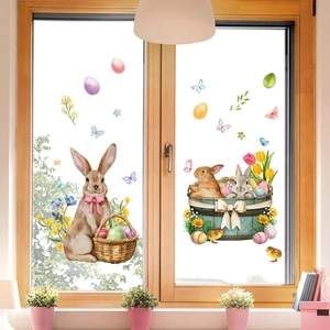 Detailed view of Easter rabbit and watercolor egg static stickers on a glass window