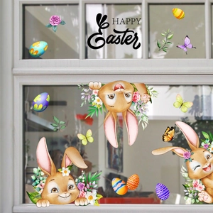 Detail of colorful Easter window stickers with cartoon bunnies, eggs and floral patterns