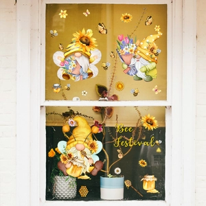 Bee Festival window decals featuring sunflowers, gnomes and butterflies on white wood glass