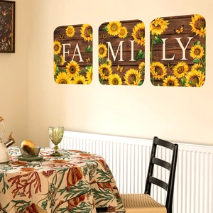 Three-piece sunflower wall sticker with Family text in a modern dining room setting