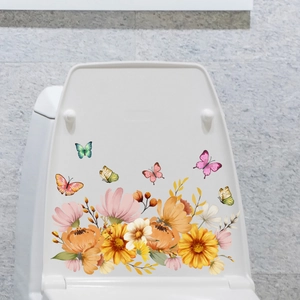 Detail of floral toilet seat decals with yellow daisies and colorful butterflies
