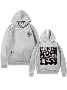 Detail view of grey hoodie showing text print and drawstring hood features