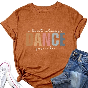 Flat lay of caramel t-shirt with I don't always dance slogan, jeans and sneakers