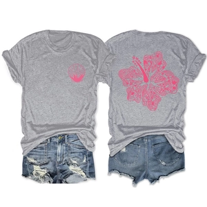 Detail of pink seashell print and hibiscus line art on grey cotton crewneck t-shirt