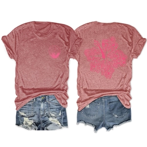Front and back view of a pink shell and hibiscus print t-shirt with denim shorts set
