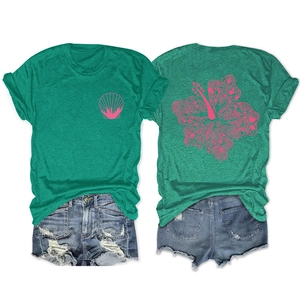 Front and back view of dark green T-shirt with pink floral print and ripped denim shorts
