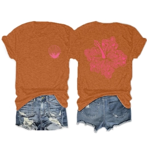 Detail of terracotta t-shirt back with pink hibiscus floral graphic and front shell print