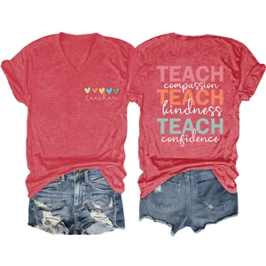 Detail of red V-neck teacher T-shirt with TEACH print and heart graphic on soft fabric
