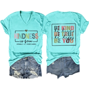 Front and back detail of V-neck turquoise T-shirt with kindness typography and denim shorts
