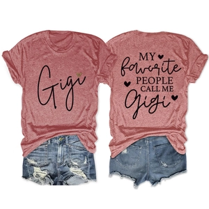 Detail view of red marl t-shirt featuring Gigi theme prints and denim shorts set