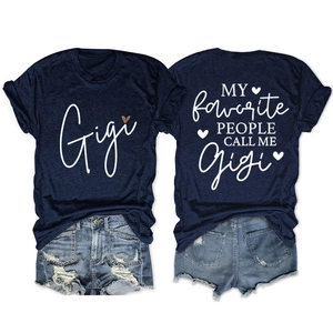 Flat lay of navy Gigi t-shirt with leopard heart and distressed denim shorts set