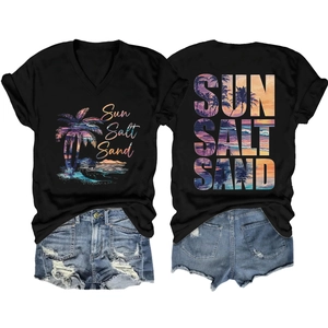 Flat lay of V-neck T-shirt with Sun Salt Sand print and distressed denim shorts