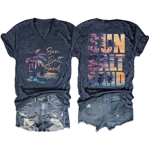 Flat lay of navy V-neck T-shirt with Sun Salt Sand print and distressed denim shorts