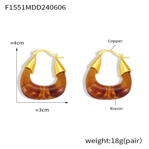 Detail view of retro U-shaped amber resin earrings with copper hardware dimensions