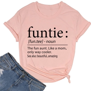 Flat lay of pink cotton T-shirt featuring 'funtie' dictionary print with blue jeans