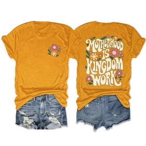 Mustard yellow t-shirt with floral print and Motherhood is Kingdom text on back