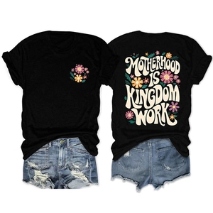 Detailed front and back view of a black t-shirt with floral MOTHERHOOD IS KINGDOM prints