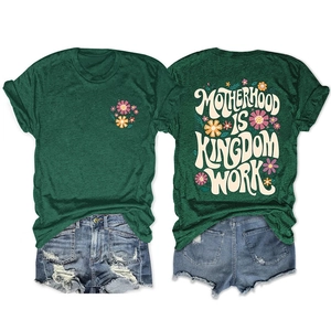 Detail view of dark green T-shirt with vintage floral print and cuffed short sleeves