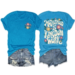 Detail view showing blue crew neck t-shirt back with floral Motherhood Is Kingdom art