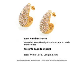 Détails des boucles d'oreilles goutte dorées avec cristaux et dimensions en acier titane