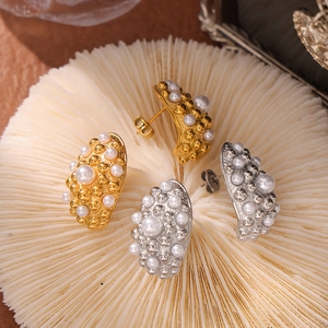 Gold and silver plated geometric pearl earrings with a minimalist semi-arc design