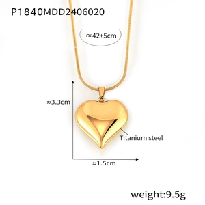 Detail view of 18k gold plated titanium heart pendant necklace showing precise measurements