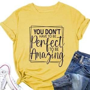 Flat lay of yellow cotton t-shirt with inspirational quote print and denim jeans