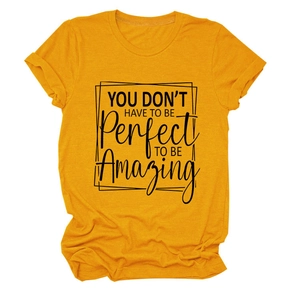 Detail view of ginger yellow cotton t-shirt with black artistic typography print