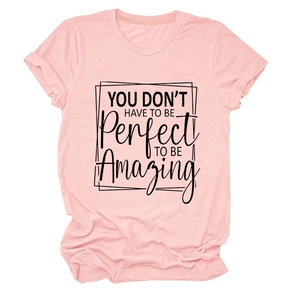 Detail of pink cotton T-shirt featuring 'You don't have to be perfect' print and crew neck