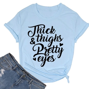Detail of light blue crew neck T-shirt featuring artistic text and side-knot styling