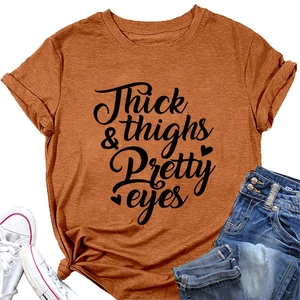 Detailed view of caramel round neck T-shirt featuring artistic text and side knot detail
