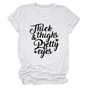 Detailed view of white cotton T-shirt featuring Thick & Thighs Pretty Eyes script print