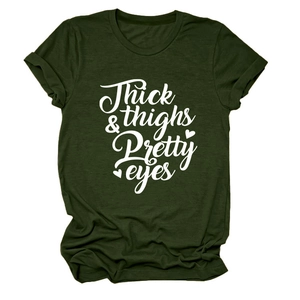 Detail of Thick & Thighs Pretty Eyes white script print on dark green cotton t-shirt