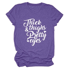 Detail view of heather purple t-shirt featuring Thick & thighs Pretty eyes cursive print