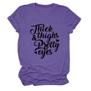 Detail of Thick Thighs Pretty Eyes slogan print on purple crew neck short sleeve T-shirt