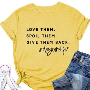 Detail of yellow cotton T-shirt featuring LOVE THEM SPOIL THEM black bold text print