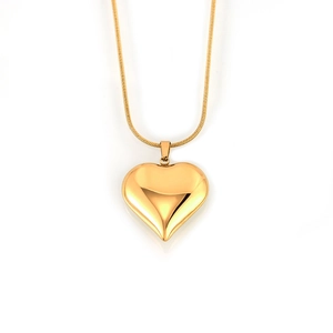 Polished 18K gold heart pendant on a sleek snake chain necklace for women