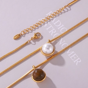 Golden stainless steel snake chain necklaces with pearl and tiger eye stone pendants